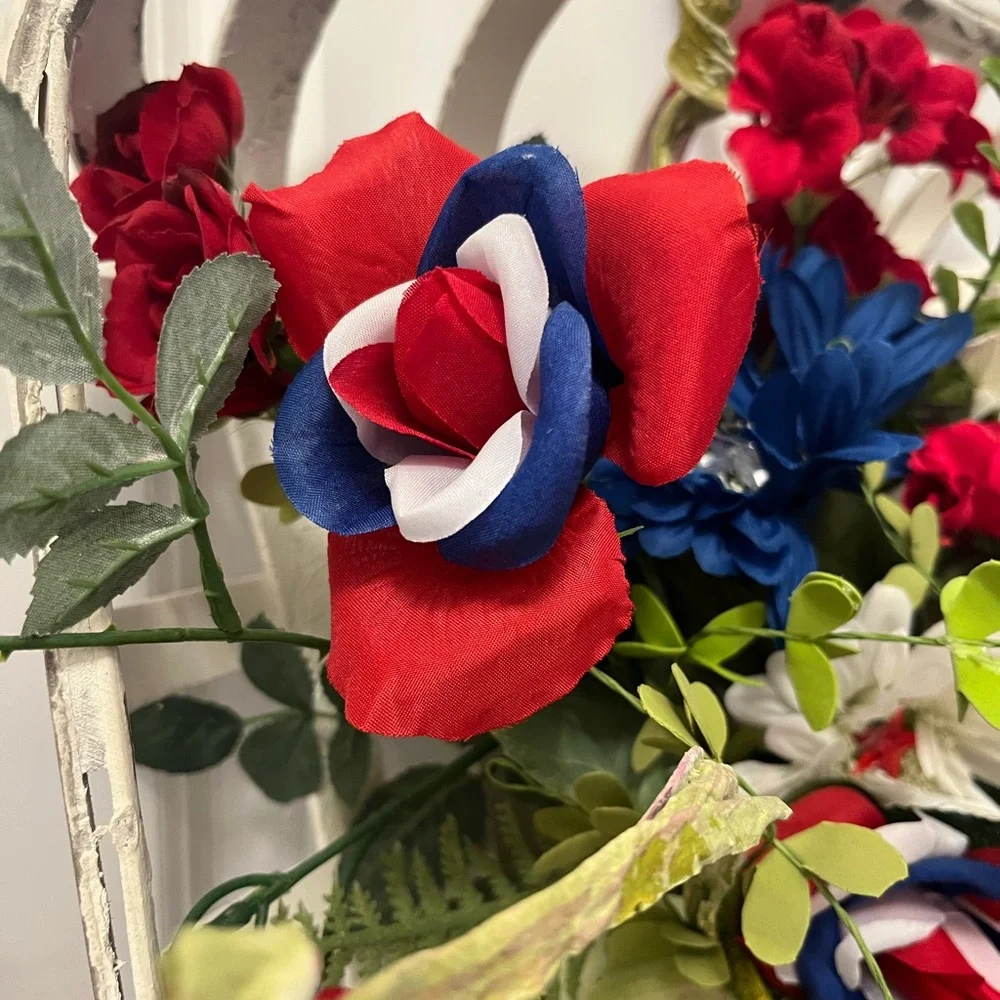 Patriotic Floral Arrangement with Red, Blue, and White Accents